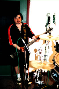 Tony Garcia on bass guitar, 1998